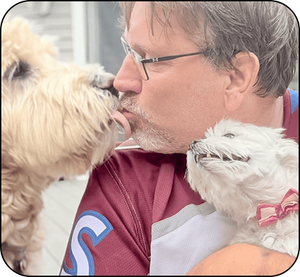 Aspen and Bella greeting Larry when he got home from work.